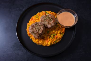 Turkey burger with yellow rice and vegetables