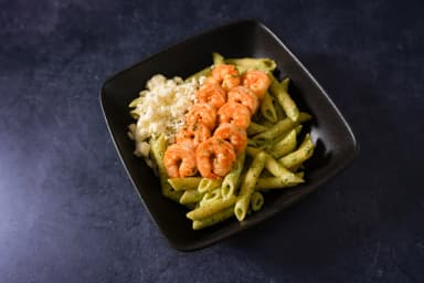 Pasta in cilantro sauce with shrimp