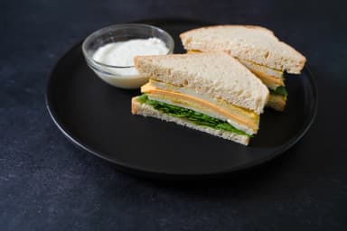 Egg and three cheese muffin sandwich