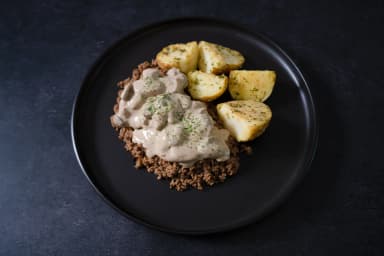 Beef stroganoff and potatoes